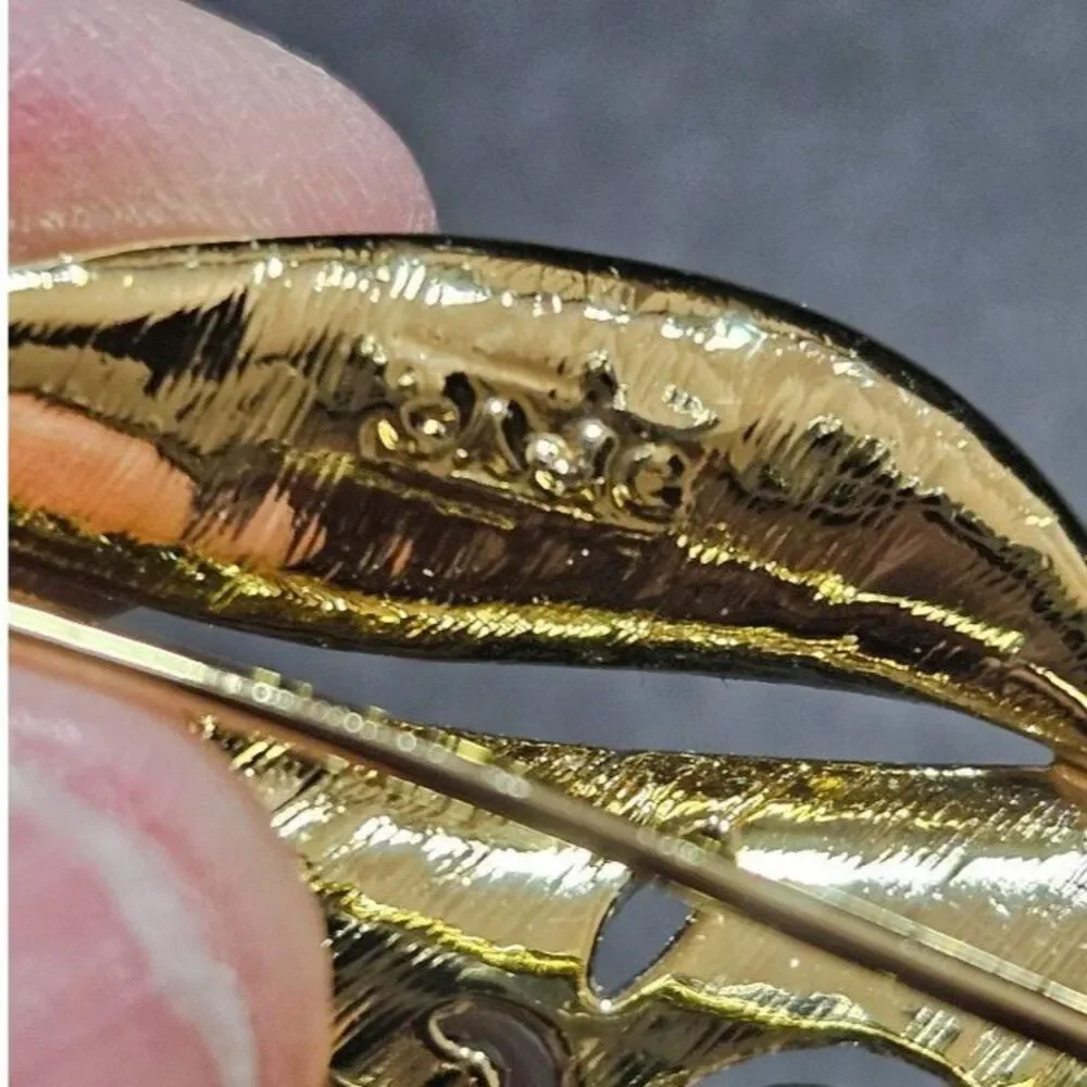AJC vintage gold tone brooch